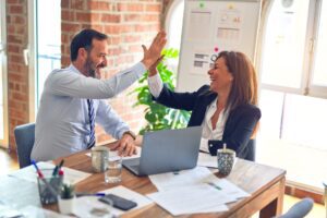 Business team members high five